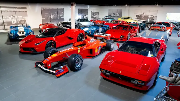 Collection of classic and exotic cars on display